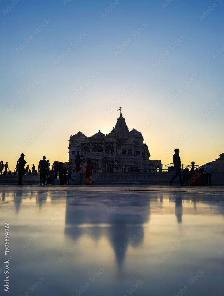 Fototapeta premium ancient hindu temple architecture with blue bright sunrise sky at dawn from flat angle