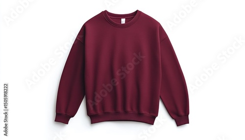 A maroon colored sweatshirt with long sleeves is placed on a white surface in a studio setting