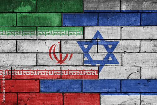 colourful painted big national flag of israel and flag of iran on a massive old brick wall background. concept