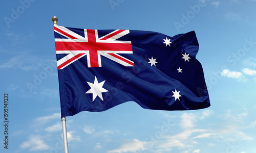 Australian national flag flying high in the sky with Union Jack and Southern Cross star constellation on a sunny day