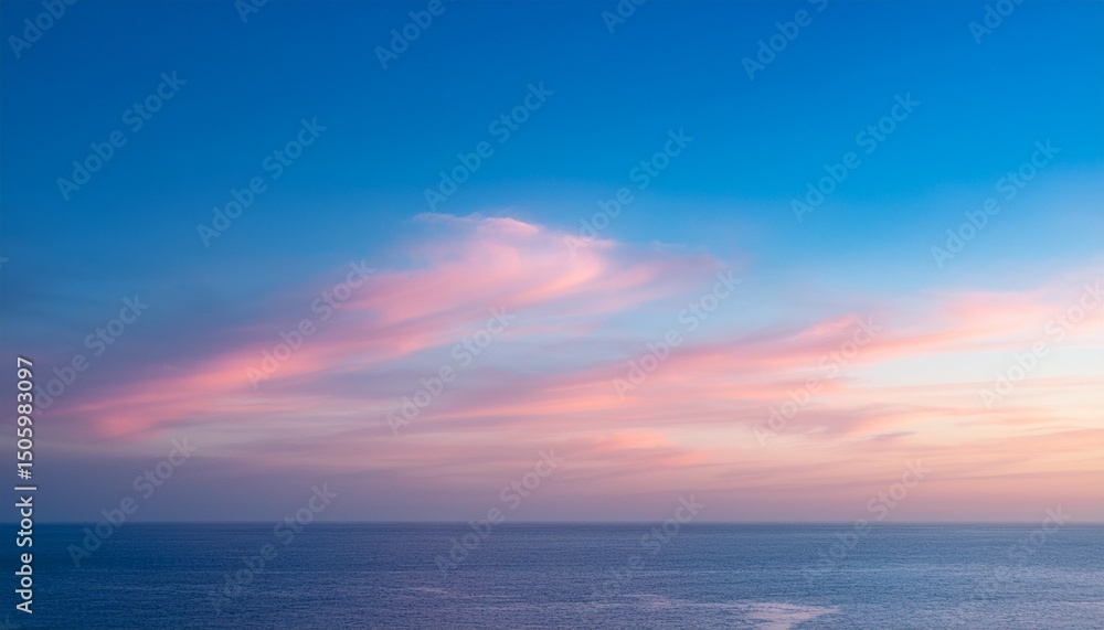 Fototapeta premium serene morning sky with pastel tones of pink and blue as the sun rises