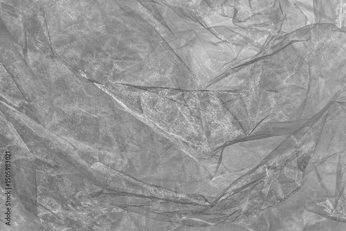 Black and white crumpled organza fabric texture background.