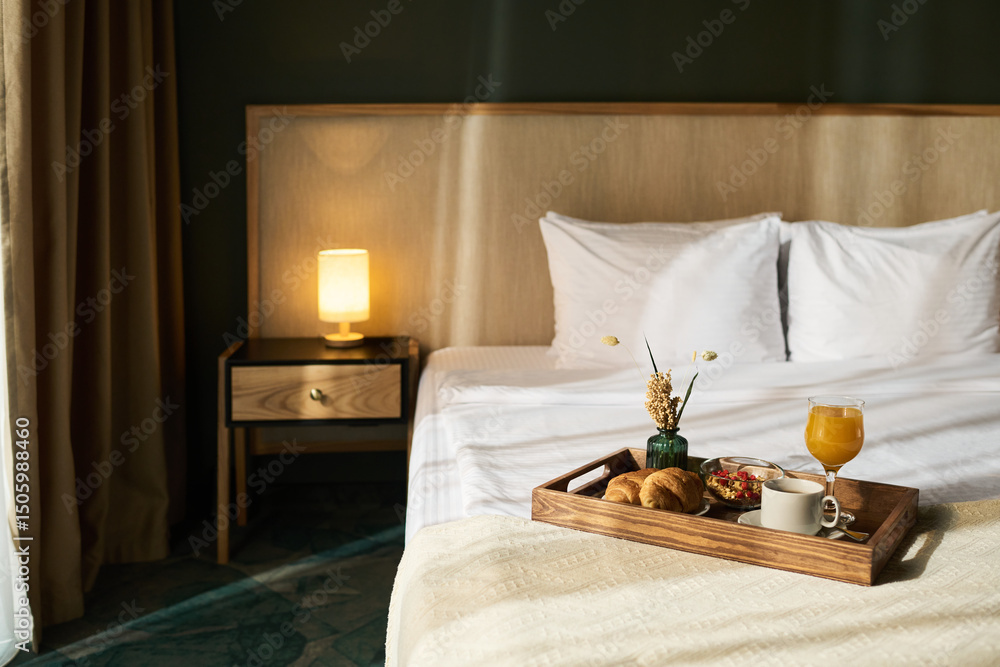 custom made wallpaper toronto digitalCozy hotel room showcased with breakfast tray on bed. Tray filled with coffee, juice, pastries, and fruit, with warm lamp providing ambient lighting next to bed