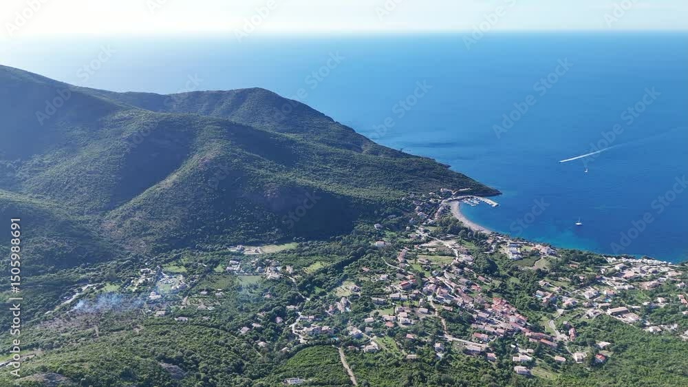 Drone Aerial View Over Galéria, Corsica – Wild Coast and Clear Waters Drone Aerial View Over Galéria, Corsica – Wild Coast and Clear Waters