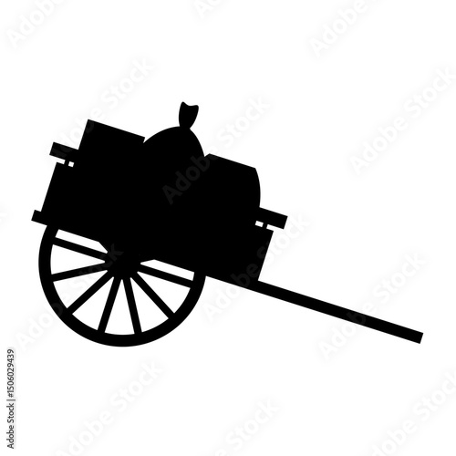 Silhouette of an old pioneer hand cart with cargo