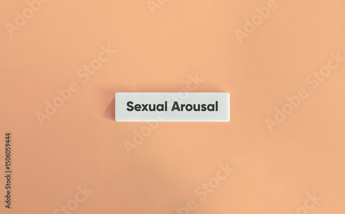 Slika na platnu Sexual Arousal Letter Tile on Soft Pink Background – Minimalist Concept of Intim
