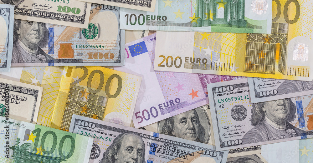 Obraz premium many dollar and euro banknote as background.