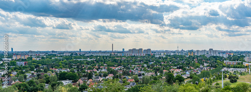 Fotografi Fantastic view of Berlin with a television and observation tower, apartments, and densely built-up areas