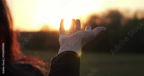symbol hope in form of palm extended to sunset rays reflects expectation future through symbol of hope, instilling optimism and dream soul of everyone, because symbol of hope beckons to new horizons