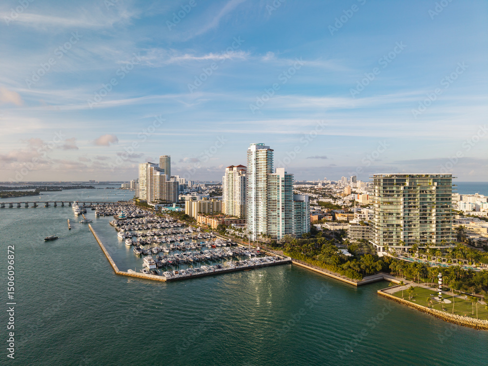 Fototapeta premium Marina dock. Luxury South beach marina. Miami south beach view. Docked luxurious yacht boat. Luxurious lifestyle. View of luxury Miami Florida. Summer vacation. Exclusive marina