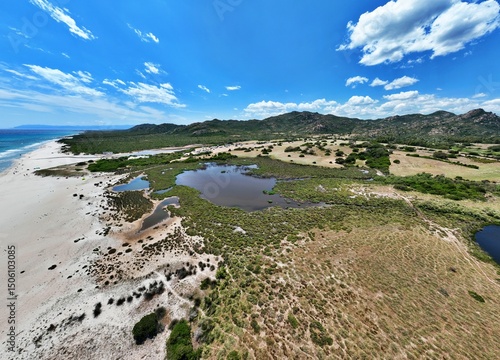 Fototapeta Naklejka Na Ścianę i Meble -  Aerial view of Berchida beach south of Siniscola, in the Baronie territory on the east coast of Sardinia island is known as one of the most beautiful beaches in the Mediterranean for its purest waters