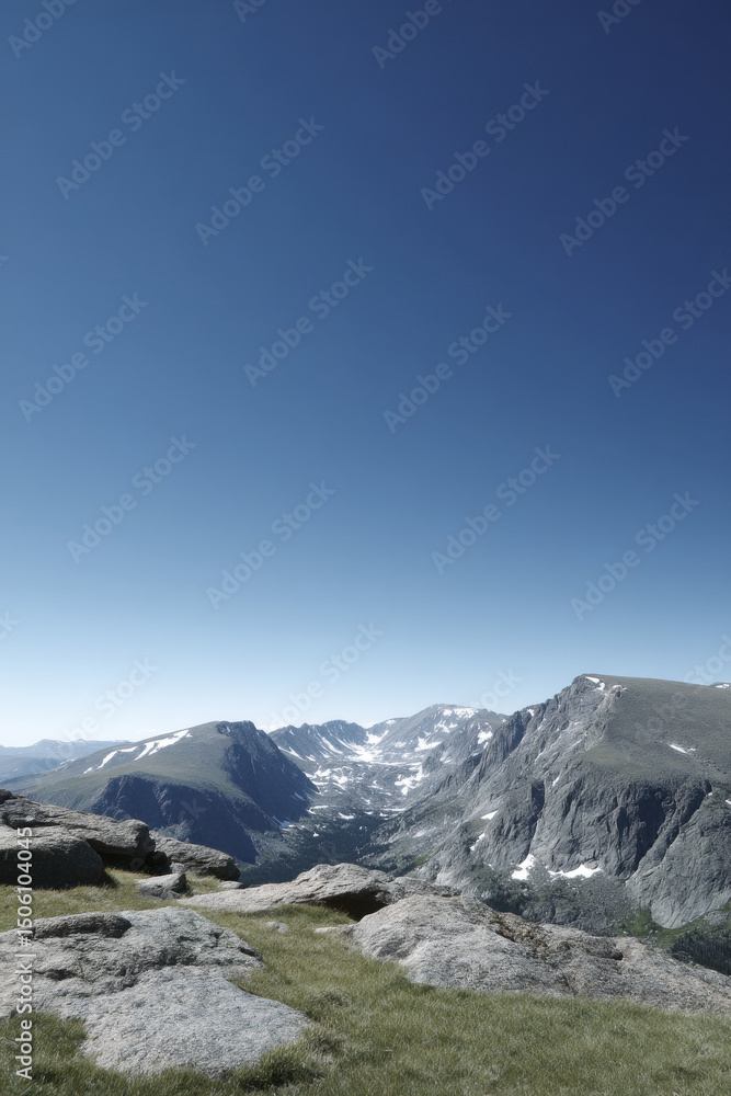 Obraz premium breathtaking view of rocky mountains in colorado under clear blue sky showcasing majestic peaks and lush green