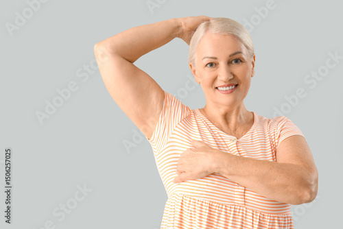 Mature woman checking her b...