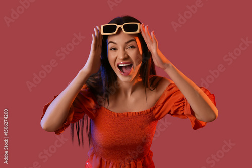 Happy young woman with sung...