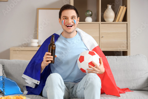 Excited french soccer fan w...