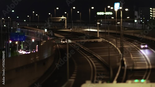 Wallpaper Mural A night timelapse of miniature traffic jam on the city highway in Saitama panning Torontodigital.ca