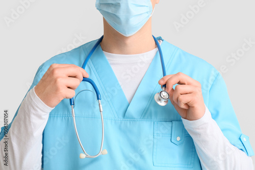 Male doctor in medical mask...