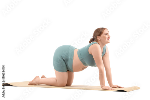 Pregnant woman practicing y...