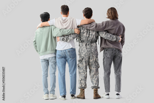 Group of young men and sold...