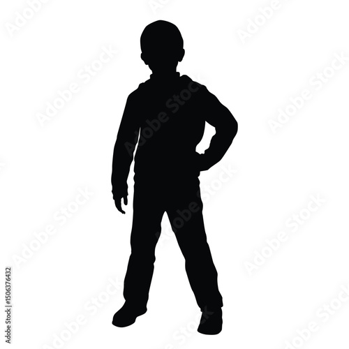 Silhouette of a standing boy with one hand on hip, showing confidence, pose, and casual stance