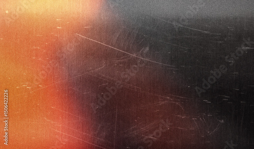 Photography grainy colorful warm orange light leaks on black background with dust texture