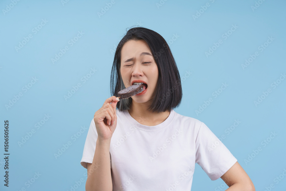 Enjoying a delicious chocolate ice cream treat during a summer afternoon Enjoying a delicious chocolate ice cream treat during a summer afternoon