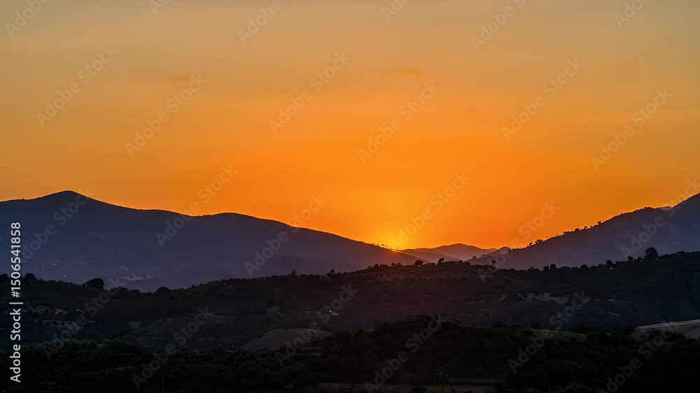 Sunset over Silhouetted Hills Sunset over Silhouetted Hills