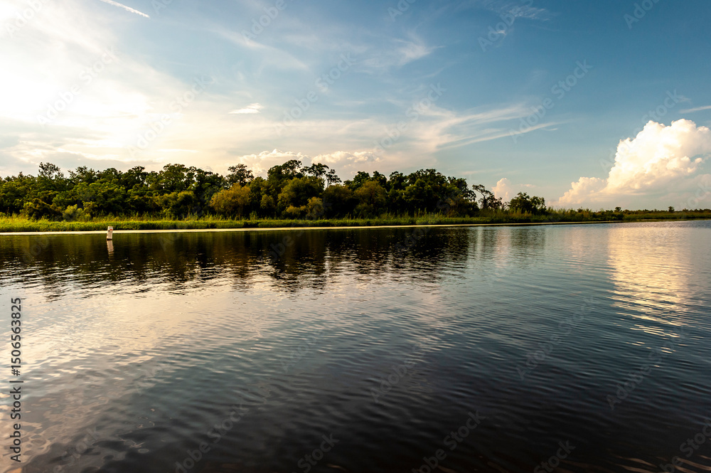 Fototapeta premium Mobile Bay on dusk with dramatic clouds.