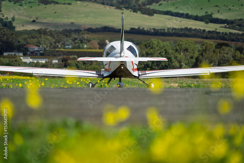 Wallpaper Mural Sport aircraft on a field Torontodigital.ca