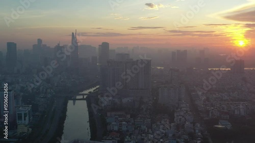 Ho Chi Minh City, Vietnam May 26,2025 4k aerial video of District 1 skyline, downtown of Ho Chi Minh City during sunrise