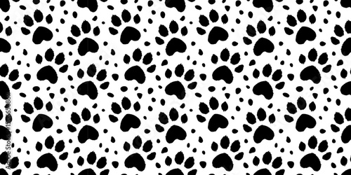 Pattern of paw prints on white background. Dalmatian dog spotted pattern. Black and white background with dog paws