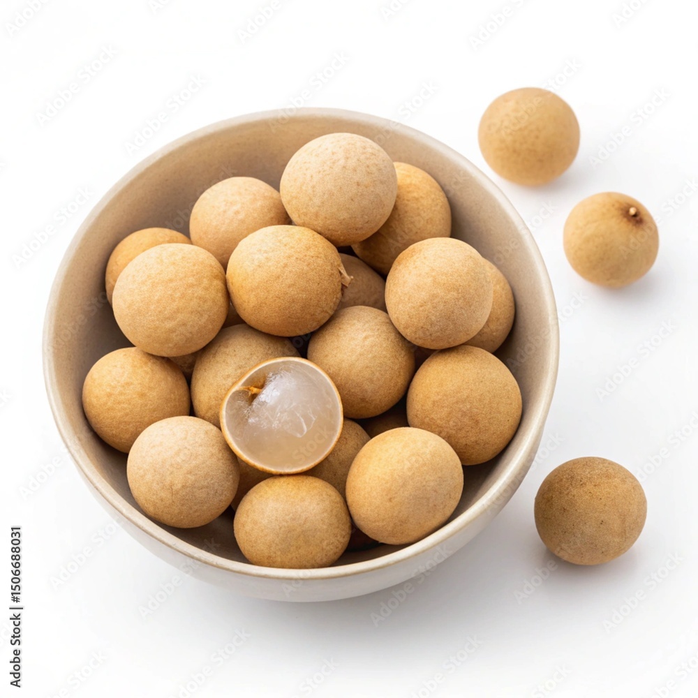 Longan fruits with shells, arranged in a minimalist bowl Longan fruits with shells, arranged in a minimalist bowl
