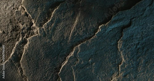 Close-up of cracked rock with layered geological texture