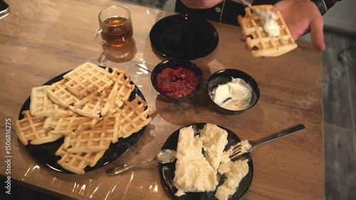 Indulge in Delicious Waffles with Various Toppings Served in a Cozy and Inviting Setting