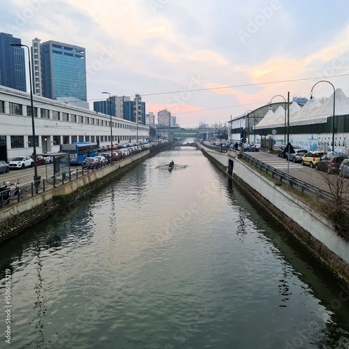 Wallpaper Mural 2024.01.26 Italy, Milan, Naviglio Grande: Bohemian gathering of the city, athletes canoeing along the Naviglio Torontodigital.ca