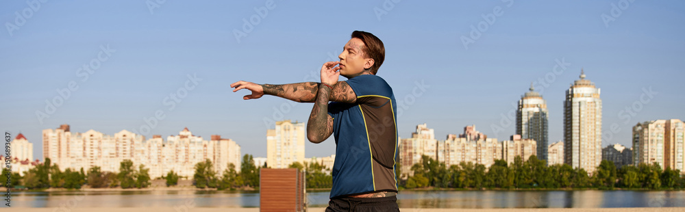 Obraz premium Handsome young man enjoys a refreshing walk by the waterfront on a sunny day