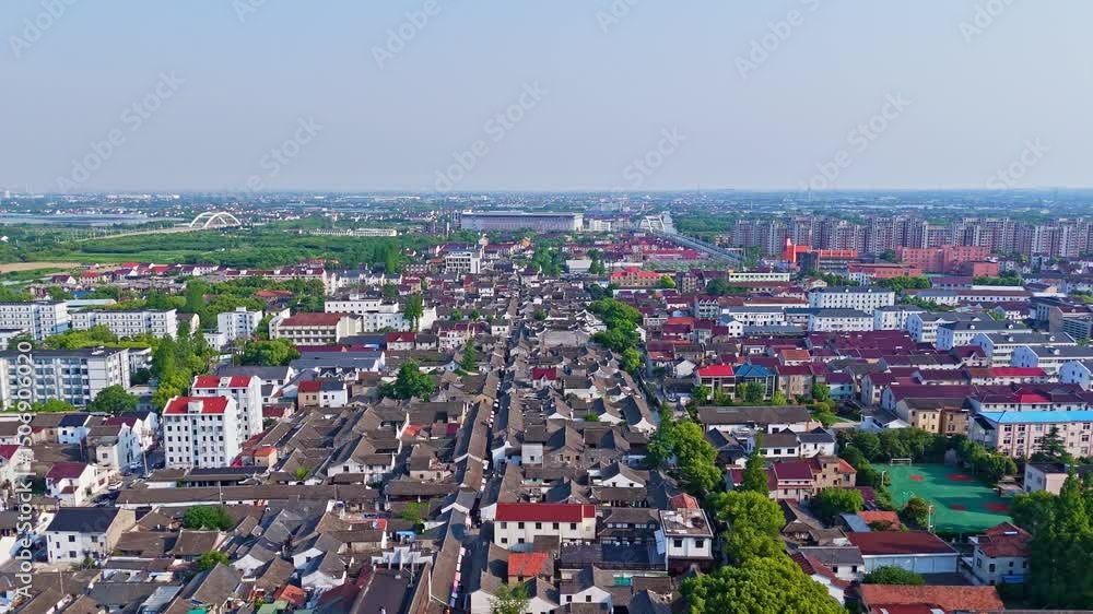 4k real time Aerial view of Shanghai Xinchang Ancient Town on sunny day. 4k real time Aerial view of Shanghai Xinchang Ancient Town on sunny day.