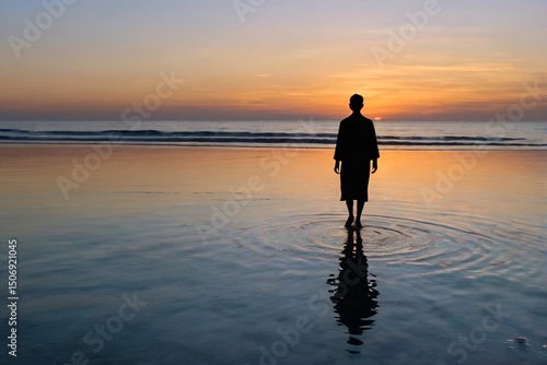 A silhouette of a figure walking toward the horizon over a calm shallow sea at twilight, perfect mirror reflection on the water, pastel colors in sky, spiritual minimalism 