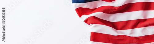 American flag waving in wind, showcasing vibrant red and white stripes with blue field, symbolizing freedom and patriotism