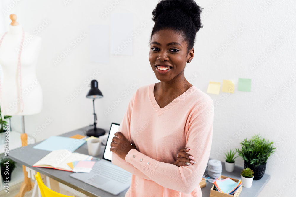 Young confident businesswoman with arms crossed standing at home office Young confident businesswoman with arms crossed standing at home office