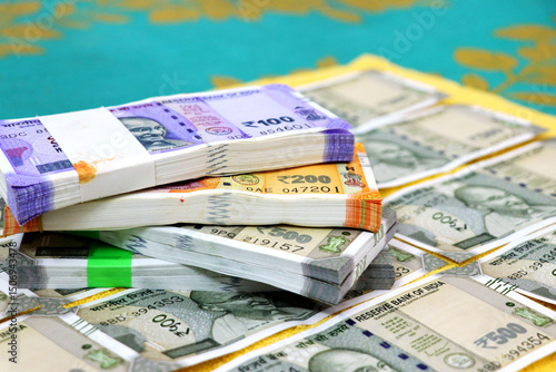 piles of new indian currency notes rupees 50,100,200 and 500