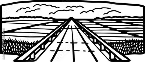 Endless road ahead journey through vast open fields to the horizon