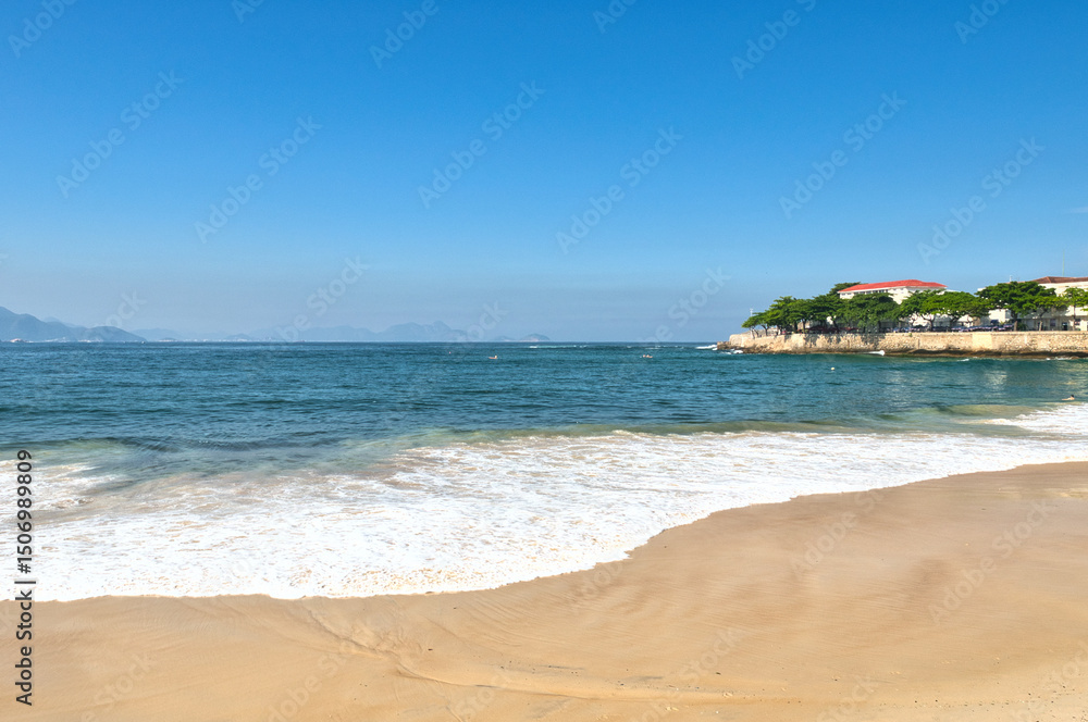 Rio de Janeiro, Brazil, May 19, 2025: Copacabana Beach is a beach located in the Copacabana neighborhood, in the South Zone of the city of Rio de Janeiro, Brazil. Beautiful blue skies and golden sand Rio de Janeiro, Brazil, May 19, 2025: Copacabana Beach is a beach located in the Copacabana neighborhood, in the South Zone of the city of Rio de Janeiro, Brazil. Beautiful blue skies and golden sand