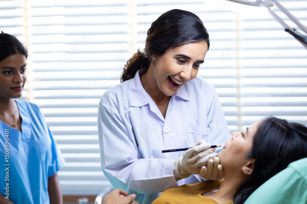 Obraz premium Facial aesthetics surgery treatment : Plastic (Cosmetic) Surgery Center : Brazilian hispanic female Doctor preparing Asian female patient for cosmetic surgery in clinic