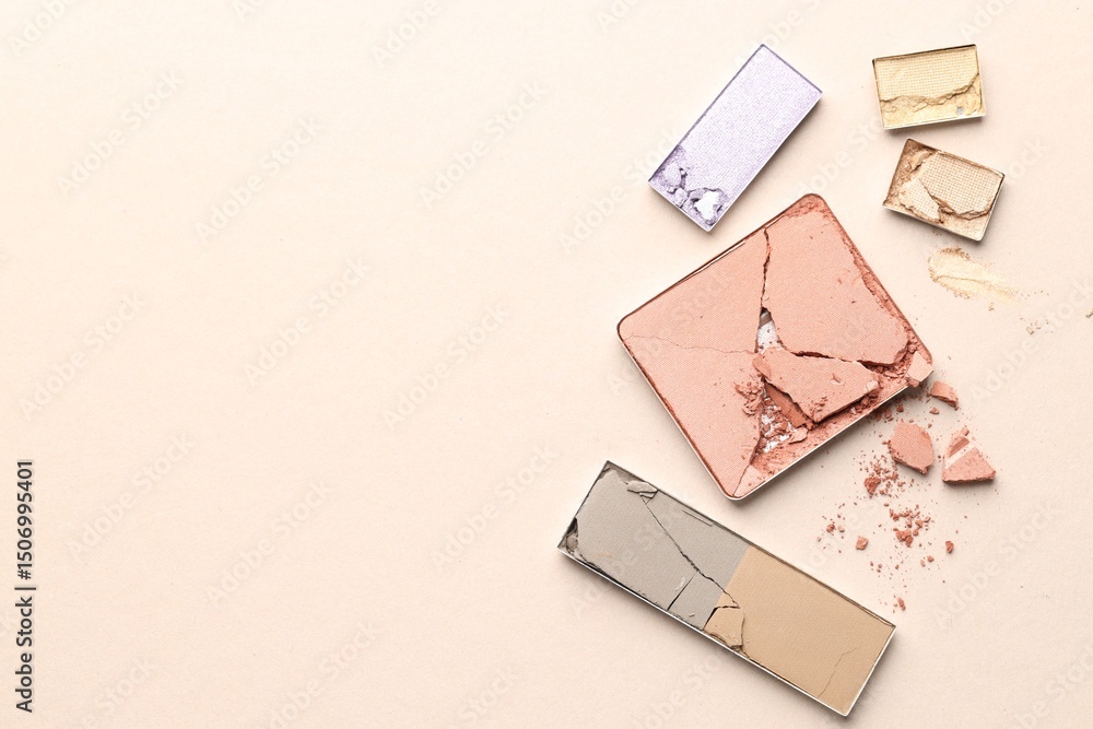 Fototapeta premium Beautiful eyeshadow refill pans on beige background, flat lay. Space for text