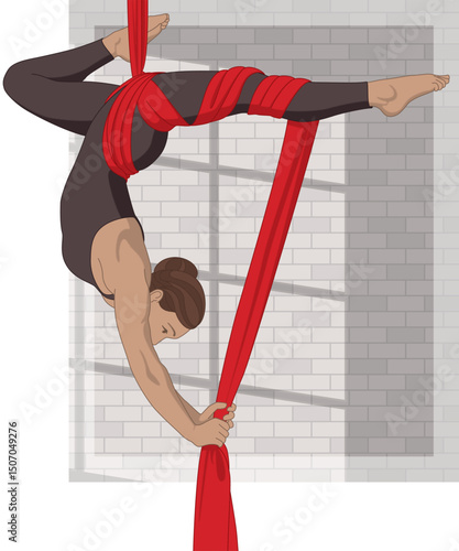 aerial silk acrobatics and sports, flexible female artist in a suspended pose using an aerial silk fabric with shadow from a window on a brick wall