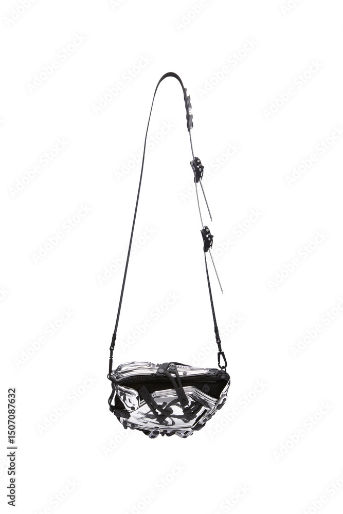 Obraz premium Modern black and white patterned shoulder bag with adjustable strap for fashionable wear