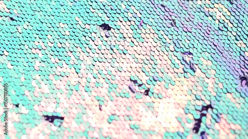 Shimmering turquoise background vibrant, pink and creating sequins textured surface reflecting glamorous party and fashion aesthetics video 4k