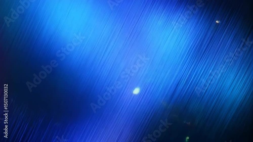 Vibrant abstract cosmic backdrop with a multicolored gradient, small dots resembling stars, and diagonal, striated light rays effect