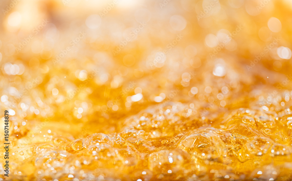 Close up bright orange Oil or beer splash texture and nature waves, Beautiful waves curve and little bubbles smooth for graphic design and background, Oil Bubbles, Soft beer bubbles, Selective focus Close up bright orange Oil or beer splash texture and nature waves, Beautiful waves curve and little bubbles smooth for graphic design and background, Oil Bubbles, Soft beer bubbles, Selective focus